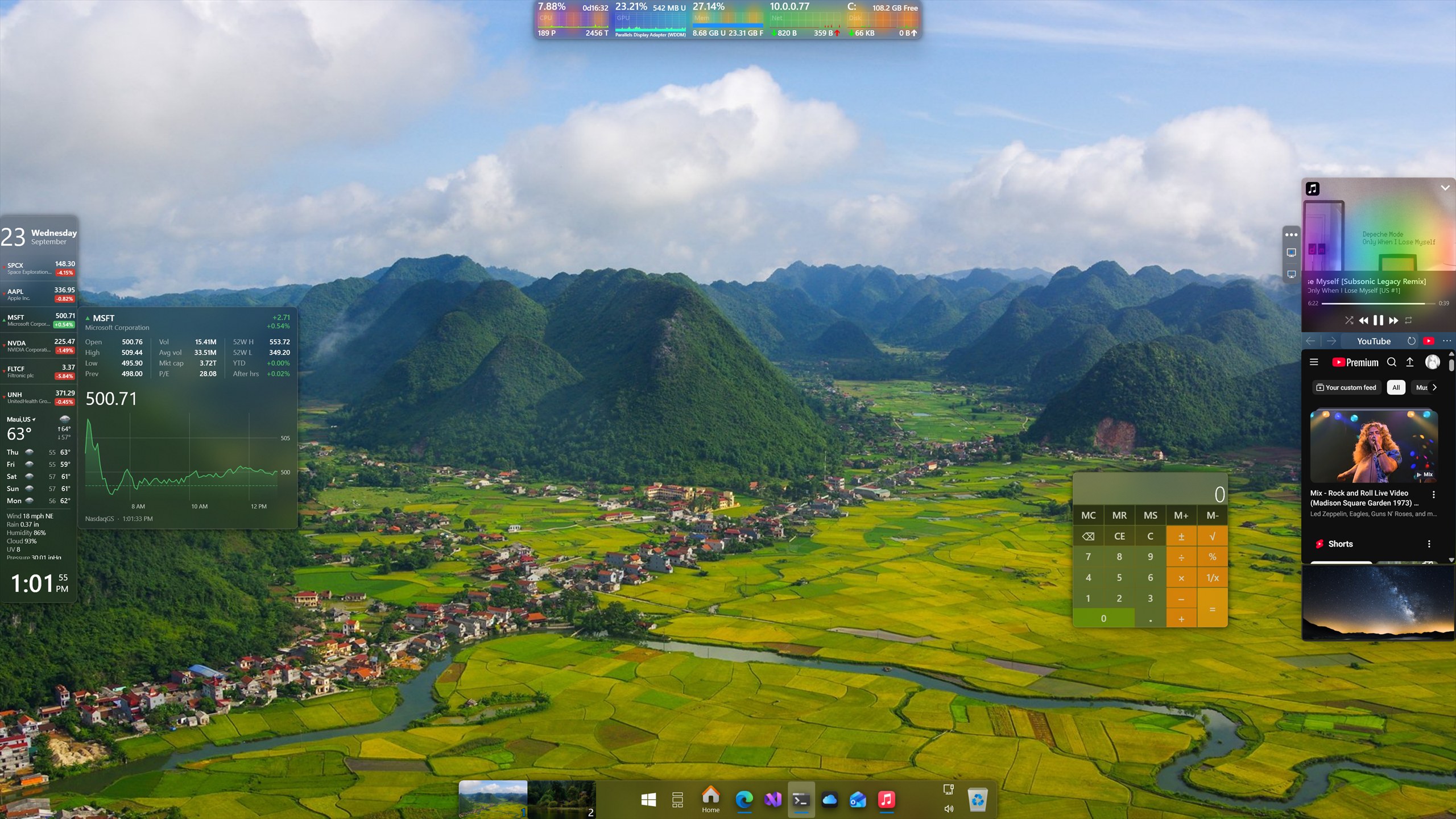 A Windows desktop running Panels: a monitoring bar across the top, a taskbar replacement along the bottom, a clock, stocks and weather panel on the left, and calculator, now playing, web browser and pictures tiles sitting free over the desktop.