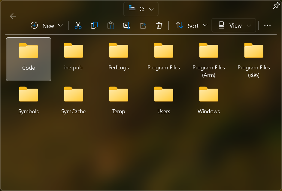 The Folder tile opened: a grid of files and folders with their icons and names, in a window beside the tile.
